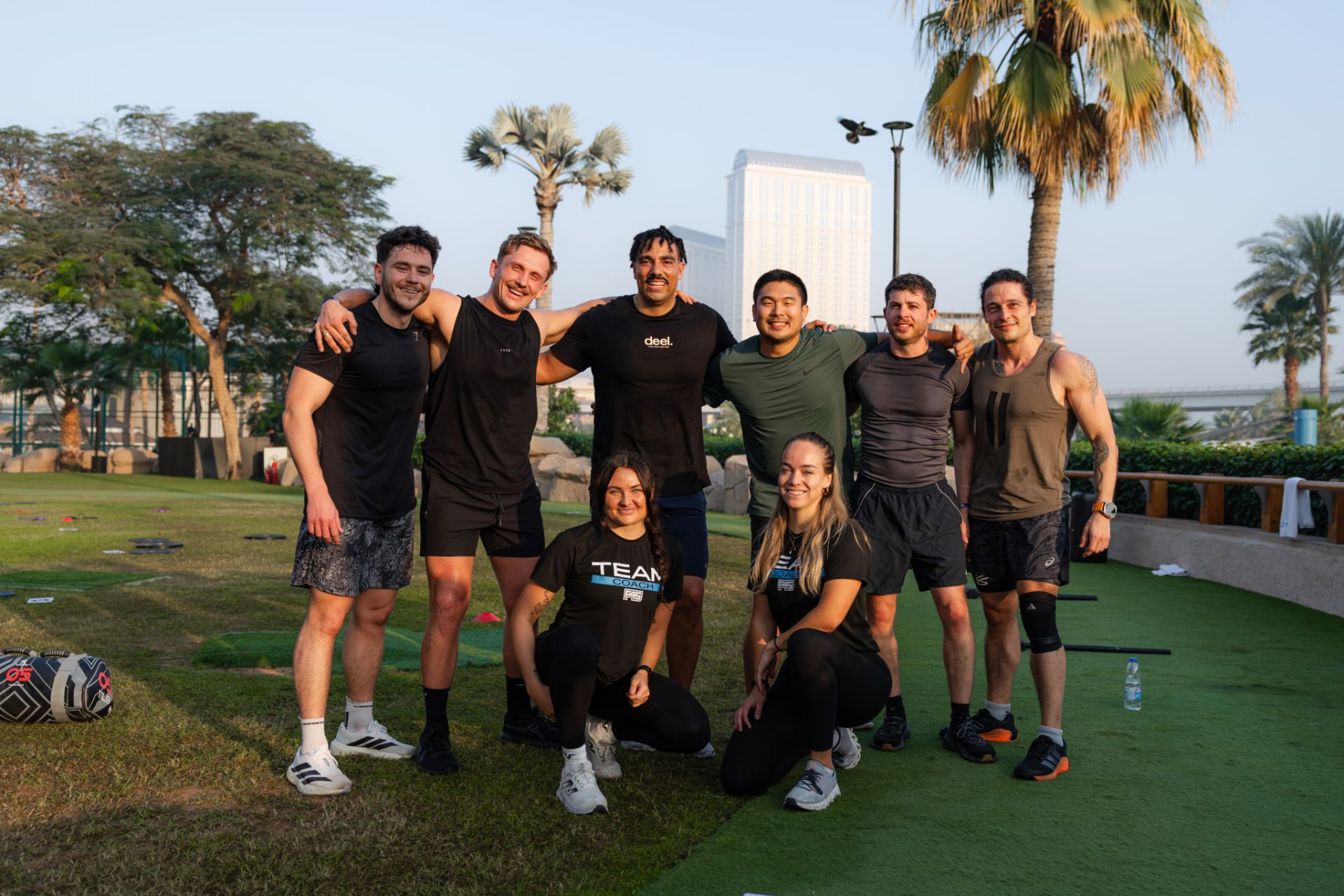 A team group photo outdoors after a morning fitness session in Dubai