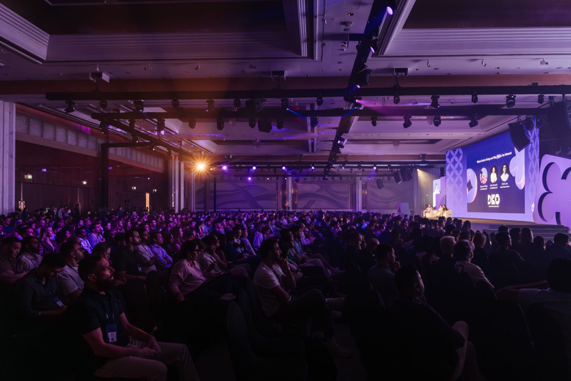 Wide view across the seated audience during a leadership session at Global Kickoff